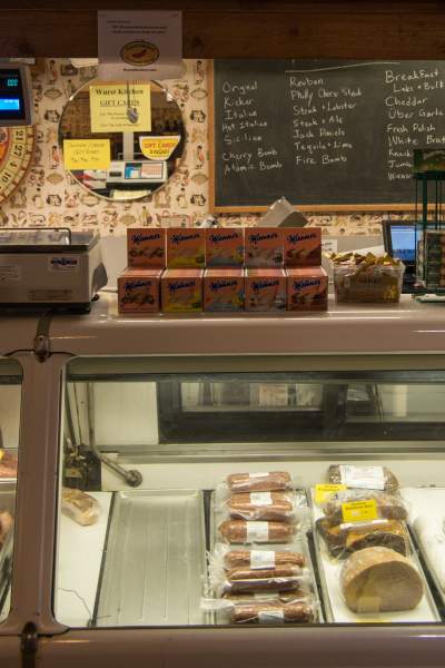 Photo of Wurst Kitchen counter showcasing their wide variety of sausages.