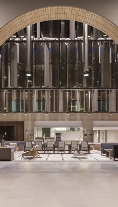 Interior of a neutral toned lobby.