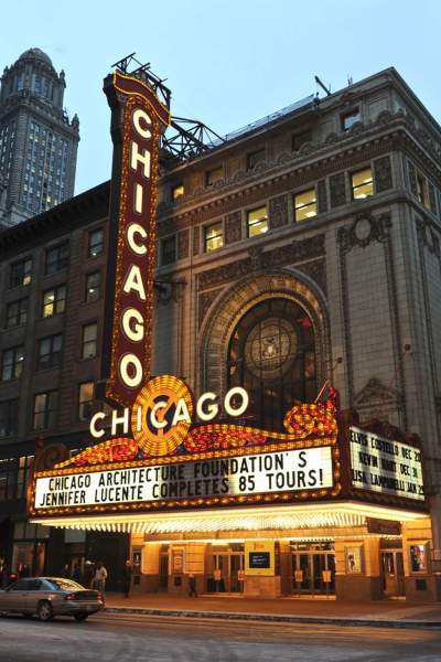 Chicago Theatre's exterior lit up at night.