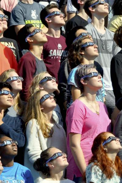 People look to the sky during the solar eclipse