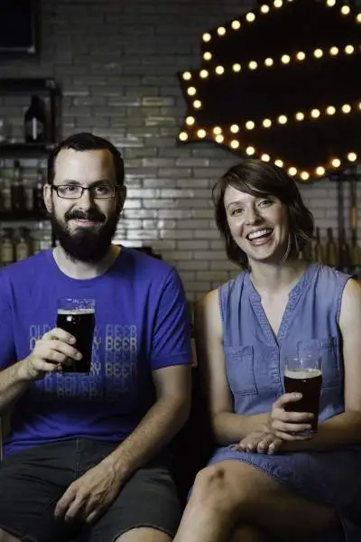 Two people drinking beer