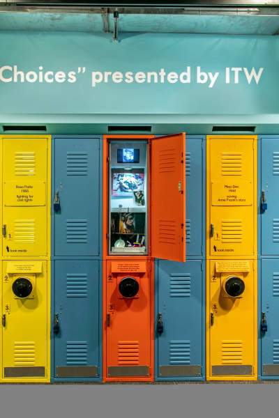 Colorful lockers with interactive screens at the Choices Holocaust Museum exhibit