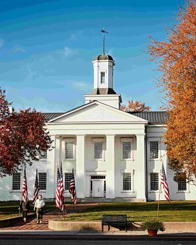 Exterior of the Vandalia State House during fall. 
