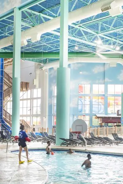 Lifeguard observing swimmers in the indoor pool