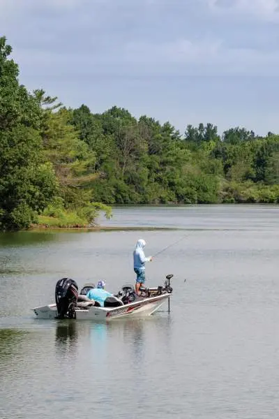 People venture out onto Homer Lake in a boat