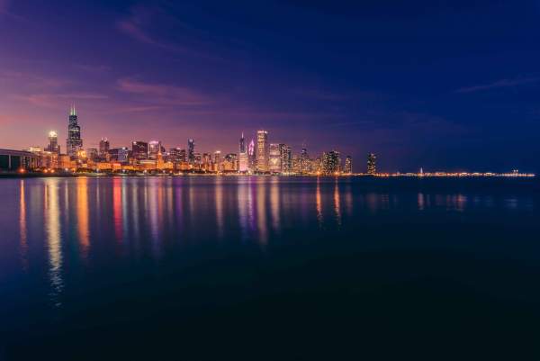 View of the lake and Chicago skyline at night