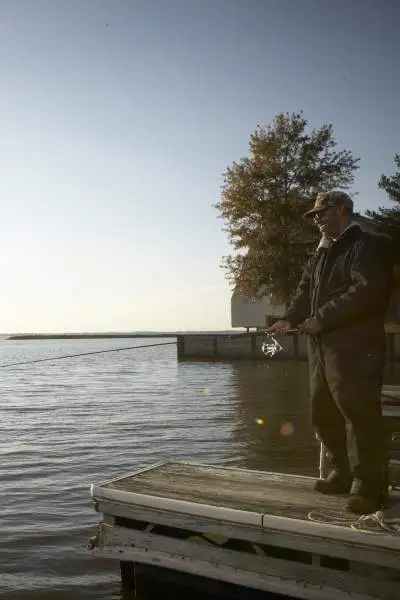 Fisherman fishing during sunrise at Rend Lake.