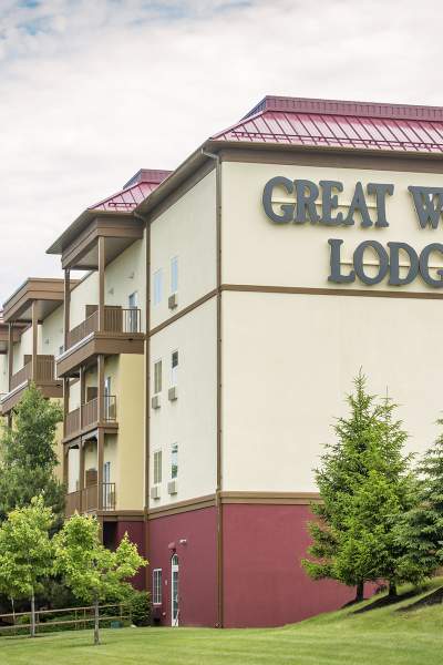 The exterior of the Great Wolf Lodge surrounded by trees