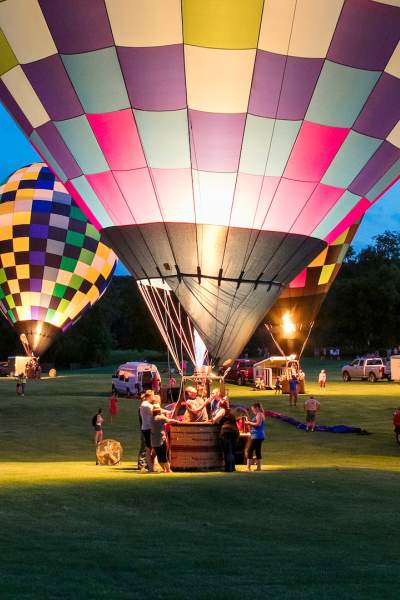 People enjoying the Great Galena Balloon Race at night.