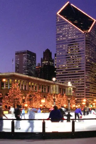 People Ice skating at night