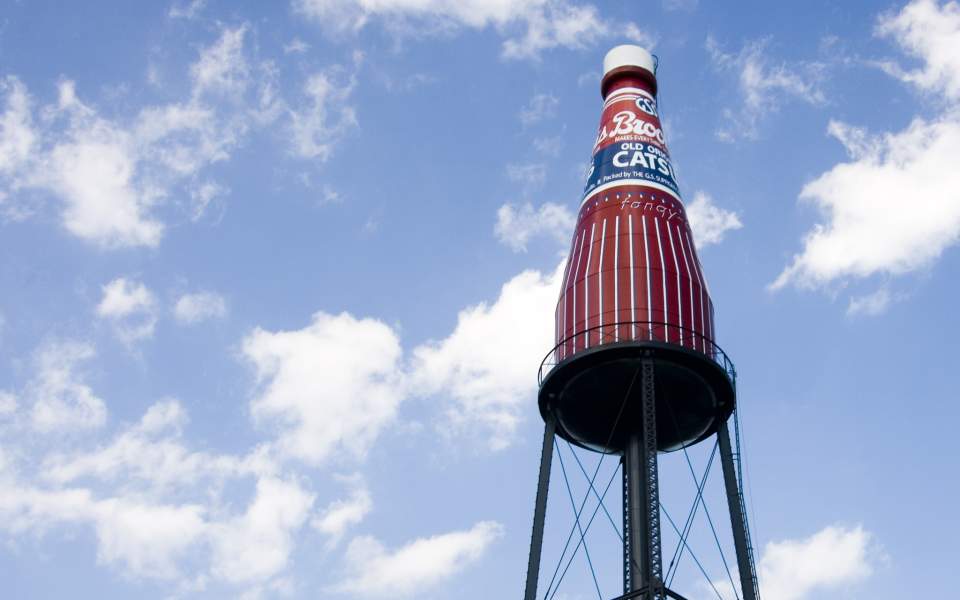 The giant Brooks Catsup Bottle against a blue sky in Collinsville