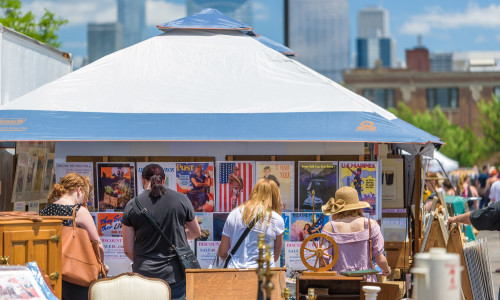 People browsing a stall at Randolph street Markets in Chicago